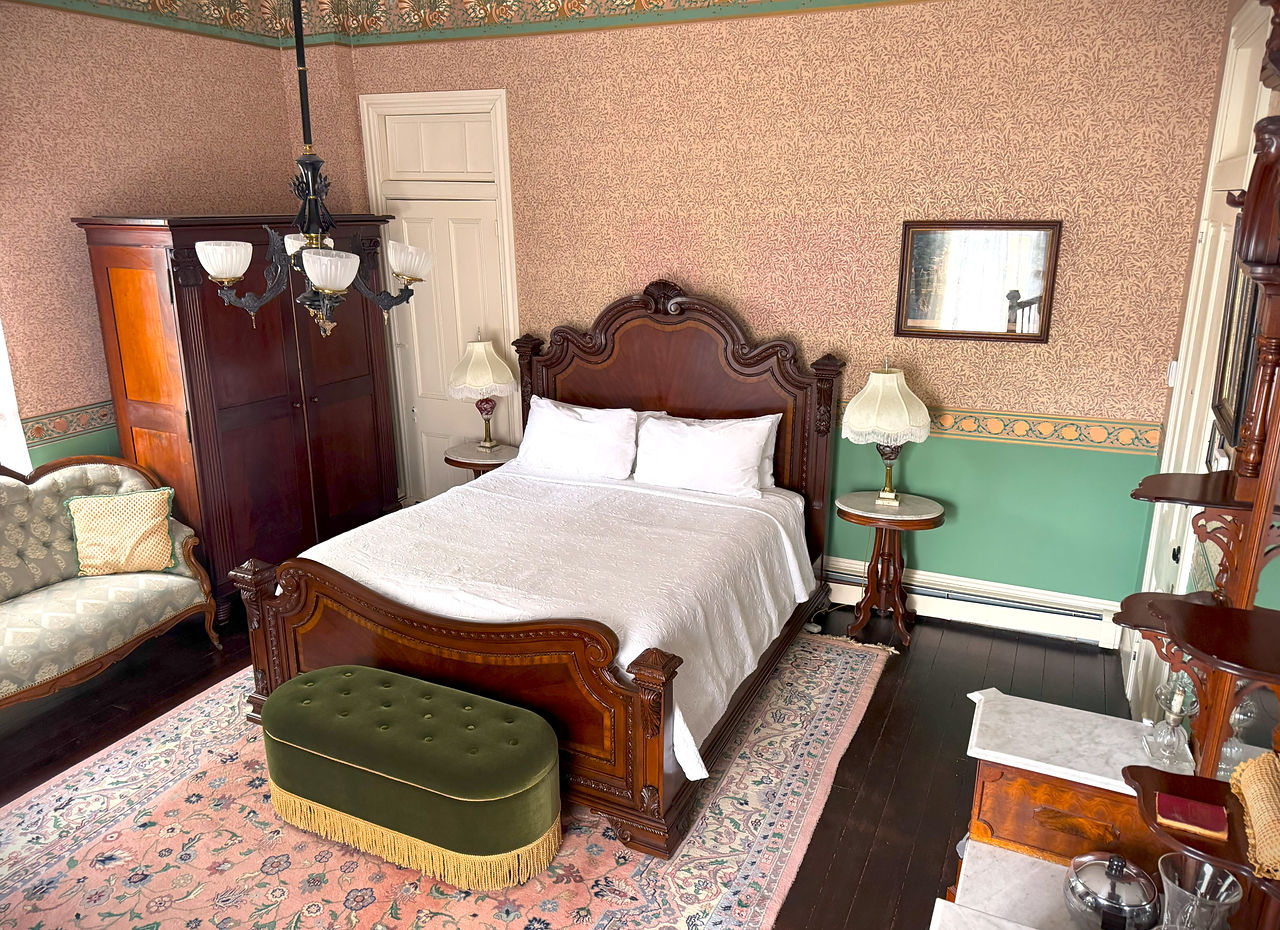 The Cardinal Gibbons Room with california king bed